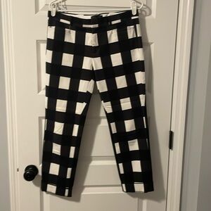 Black and white large check ankle pants. Front zip and button